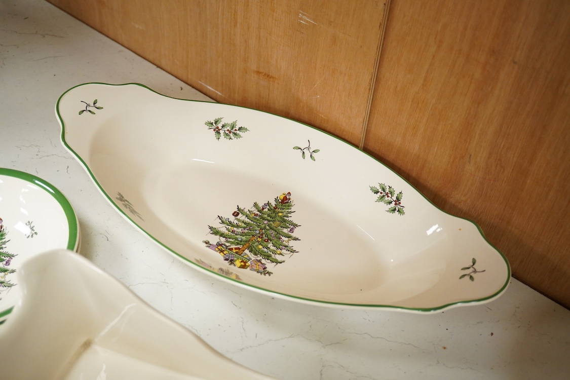 A Spode table service, Christmas Tree pattern. S 3324 to include a set of four bowls, platter and dishes, with some boxes, largest 36cm wide